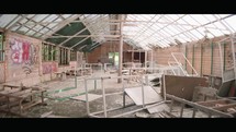 Nature's Reclaim: Abandoned Greenhouse Overrun by Nature