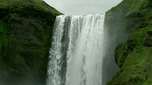 water flowing over a waterfall in Iceland 