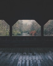 standing under a covered bridge 