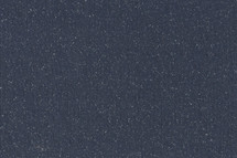 Navy textured background with flecks of color