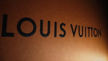 February 2024 - Paris, France. Louis Vuitton label logo brand box. Luxury fashion french company. High quality 4k footage