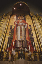 painting of Jesus at an altar