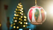 Colorful Christmas ball hanging from the tree