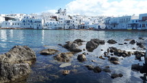 view of white buildings on an island in Greece 