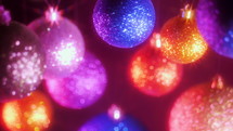 Retro style footage. Shiny sparkle glass balls - decorations for New Year and Christmas tree. Holiday festive mood. Abstract baubles background. Wishing Merry Christmas.