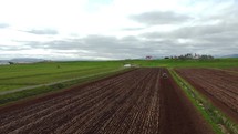 Tractor Cultivating process aerial view