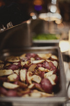 Potatoes served a la carte in a metal pan