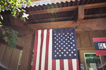 American flag hanging on storefront 