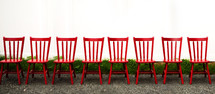 Row of red chairs outside