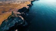 drone flying over shoreline of Iceland 
