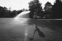 girl holding a hose 