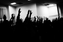 raised hands at a worship service