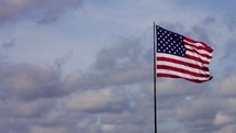 An American flag on a flagpole 