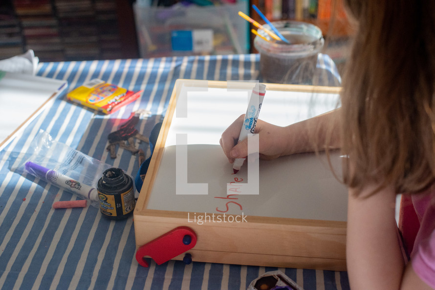 A child doing school work at home.