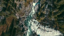 aerial view over a waterfall and river in Norway 
