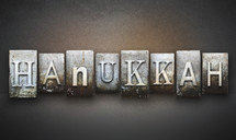 word Hanukkah in letter stamps 