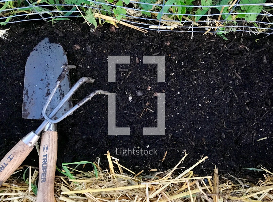 gardening tools on soil 