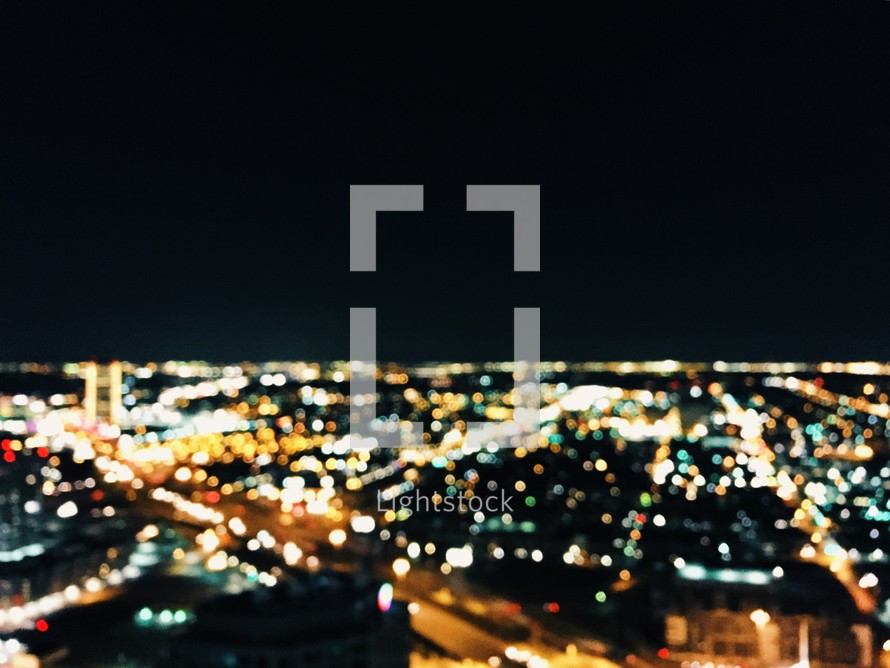 aerial view above a city at night 