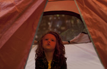 a girl in a tent 