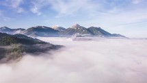 Aerial view of foggy mountains landscape Time lapse
