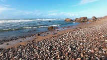 Rocky beach in Morocco ocean coast in beautiful summer holiday travel background, ideal for surf practice