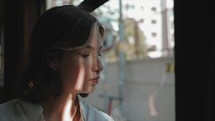 Young Woman travelling on a bus in Istanbul