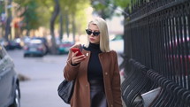 Portrait Of Young Blonde Woman in the City