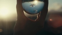 Glass ball with upside down reflection of the world