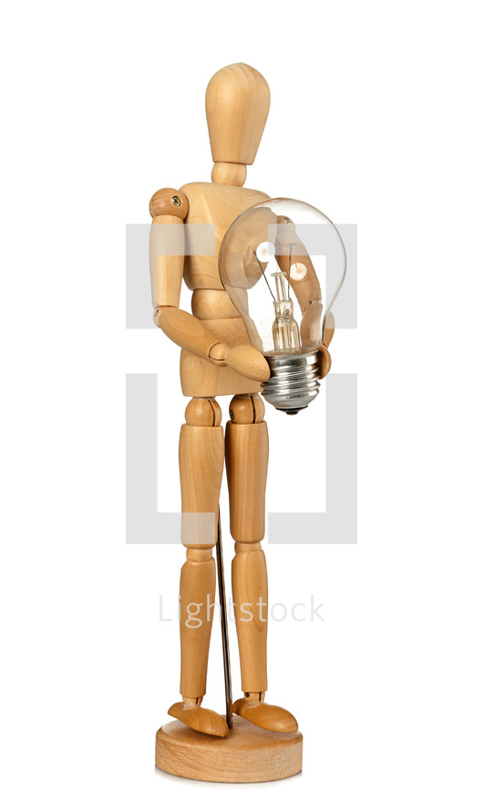 Wooden dummy that maintains a light bulb in hand on white background