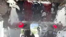 Blurry windshield view of carwash