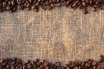 coffee beans border on burlap 