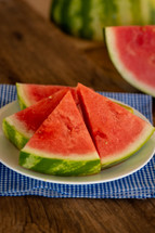 slices of watermelon on a table 