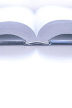 Closeup of the spine of an open book or bible