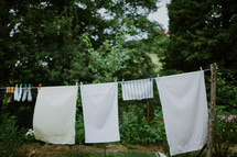 Laundry hanging outdoors on a clothesline.