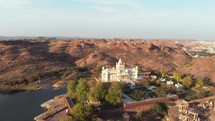Panoramic of Jaswant Thada cenotaph outside city grounds in Jodhpur, Rajasthan, India - Aerial Orbit shot