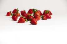A group of red strawberries isolated on white 
