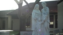 statues of the Holy family in a courtyard 