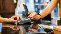 paying at a store with a credit card