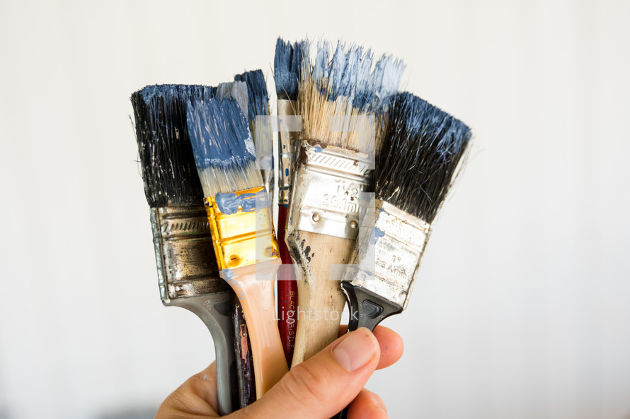 a handful of paint brushes
