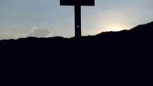 cross silhouette at sunset 