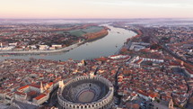 Rhone river large aerial view over Arles southern city of France sunrise 