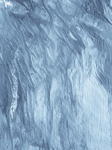 blue and white textured paint on canvas background 