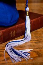 graduation cap and Bible 