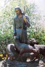 The Good Shepherd - An image of Jesus with a shepherd's staff overlooking several sheep who know their master's call. 