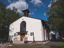 exterior of a white church 