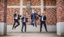 groomsmen jumping 