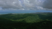 green mountains and ocean 