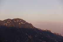 sunlight on a mountain peak in Italy 