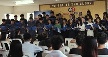 People singing in a church in the Philippines