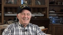 A senior WWII Navy veteran sharing stories about the war